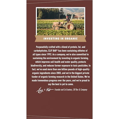 CLIF BAR & Company advertisement with a farmer in a field and text about organic farming investment.