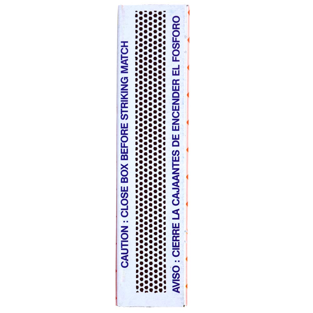 Close-up of matchbox striker strip with safety warning text for striking matches safely and preventing accidental ignition
