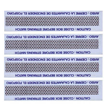 Close-up of striker plate strips for box sealing machine with warning text for safe operation and handling
