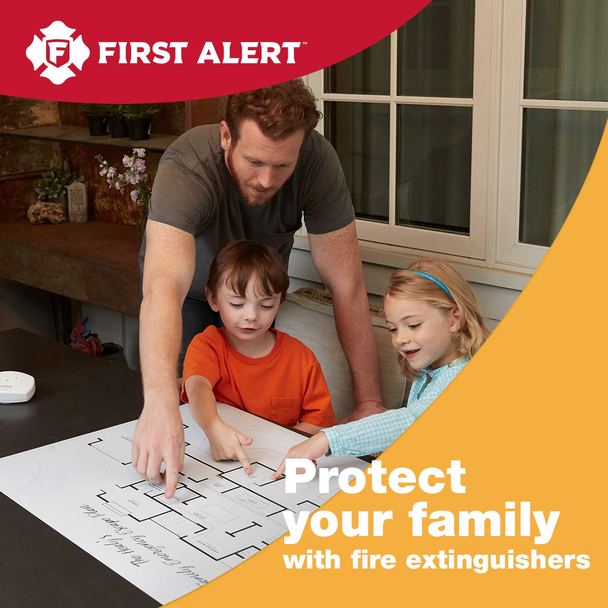 Man and two children looking at a fire safety map with First Alert branding.